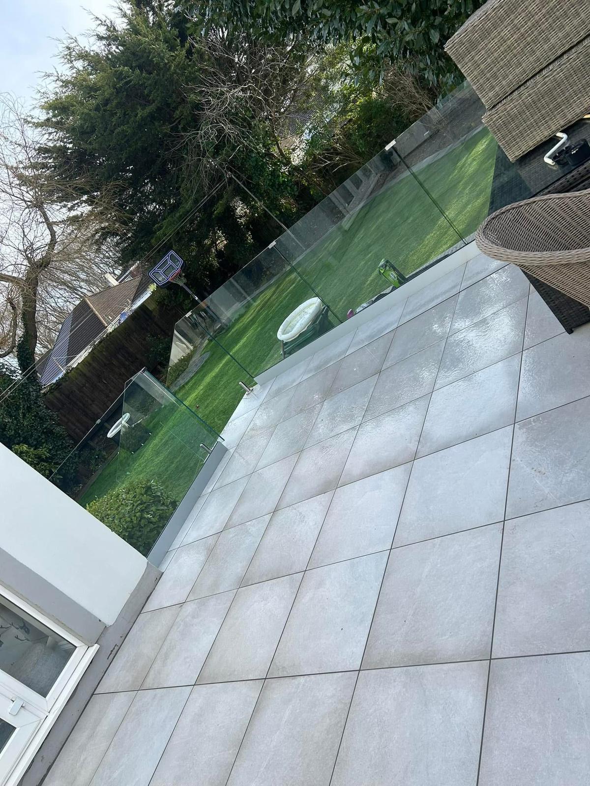 Porcelain patio after JPE pressure washing — spotless finish