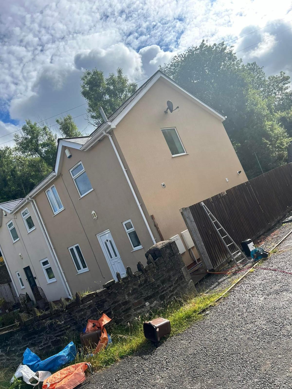 Render after softwashing — clean, even finish restored