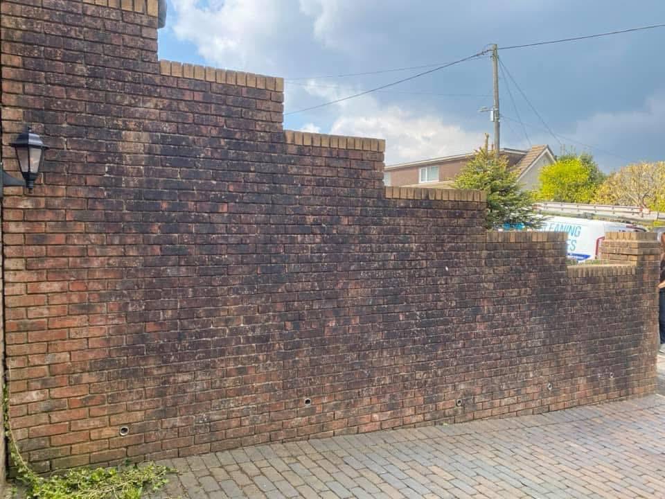Commercial brickwork before pressure washing — dirty façade